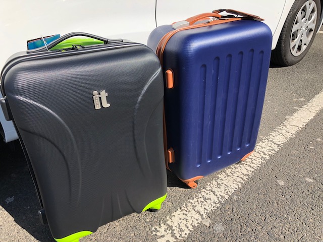 New suitcases - long term travel packing list and tips