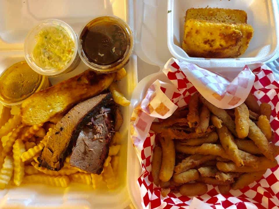 Brisket BBQ platter with cornbread and fried pickles from Rob's Family BBQ, Davie, Florida.