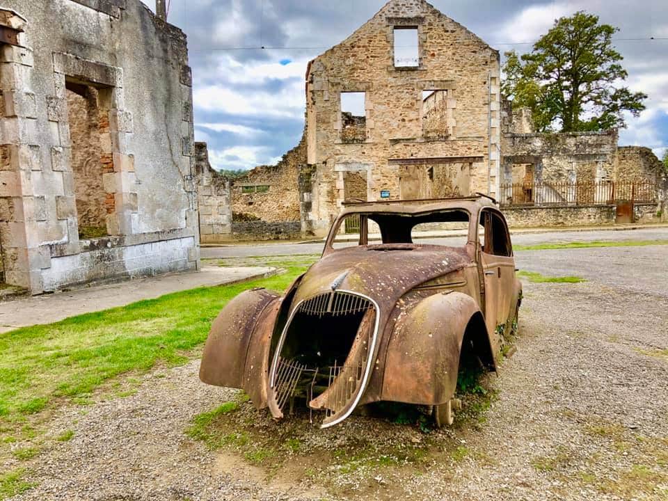 An old car left at the martyr village of Oradour sur Glane