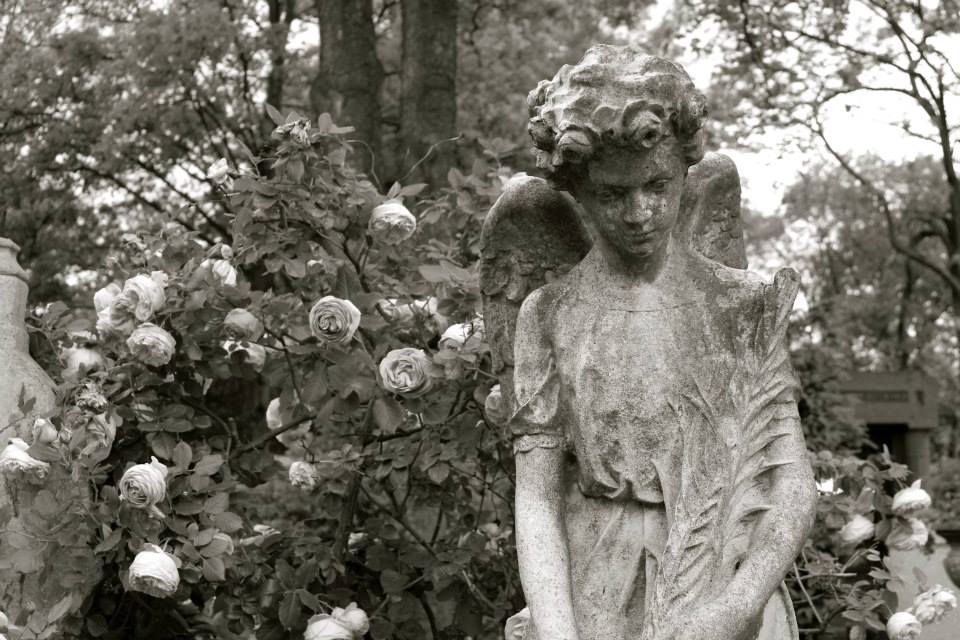 Statue at Pere Lachaise Cemetery, France