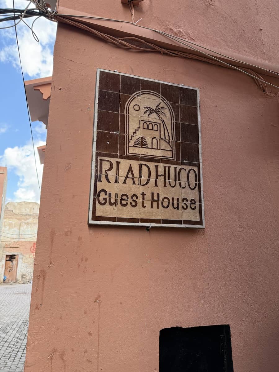 Riad Hugo sign